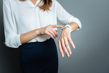 Modern smartwatch being on a womans wrist