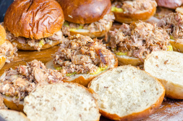 Preparing burgers at the barbecue outdoors