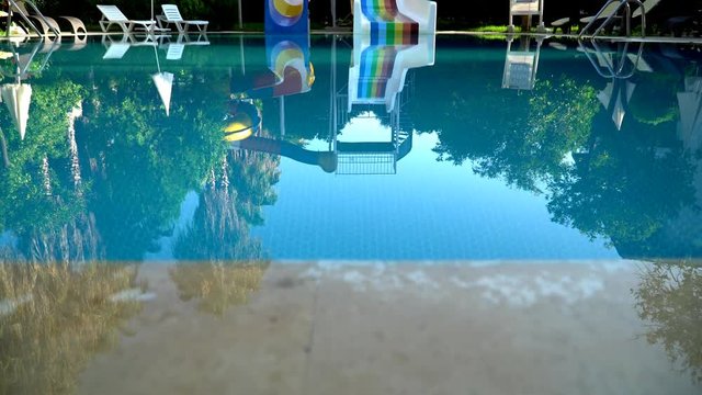 empty swimming pool with slides