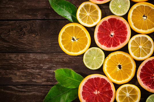 various fresh slices of citrus background.