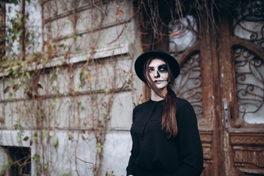 gothic young woman in  halloween costume