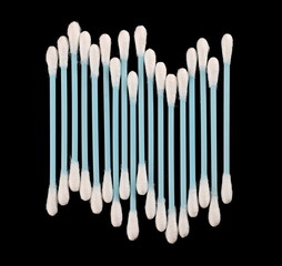 Soft cotton swabs isolated on black background