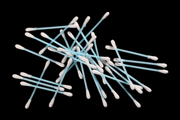 Soft cotton swabs isolated on black background