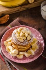 Obraz na płótnie Canvas American pancakes with banana, chocolate
