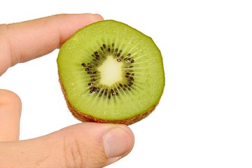 Kiwifruit also called chinese goosebery or latin Actinidia sliced in a half held in left hand on white background, front view, 