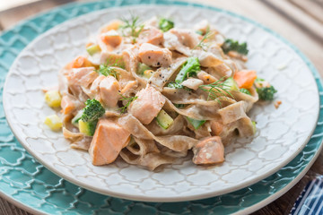 Pasta with salmon in a creamy sauce