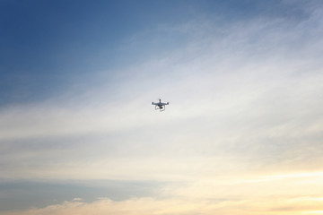 Fototapeta na wymiar Drone on the evening sky.