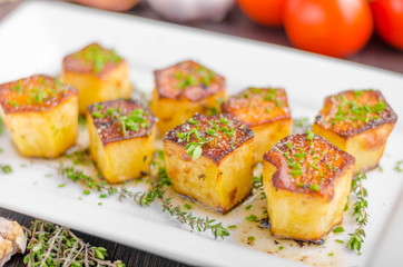 Potato fondant with garlic and herbs