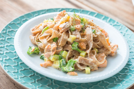 Pasta with salmon in a creamy sauce