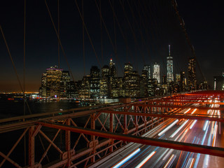 Obraz na płótnie Canvas manhattan and brooklyn bridge at night
