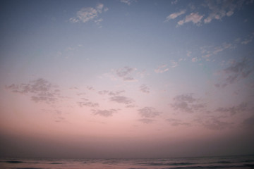 Fototapeta na wymiar Golden sunrise sunset over the sea ocean waves