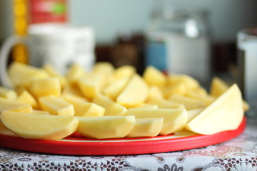 Raw cut potatoes before cooking for designer