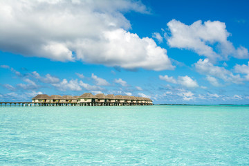 Wooden villas over water of the Indian Ocean, Maldives