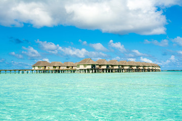 Wooden villas over water of the Indian Ocean, Maldives