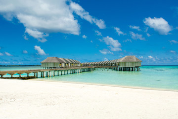 Wooden villas over water of the Indian Ocean, Maldives