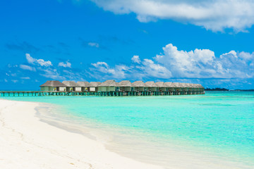 Wooden villas over water of the Indian Ocean, Maldives