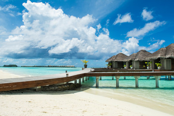 Wooden villas over water of the Indian Ocean, Maldives