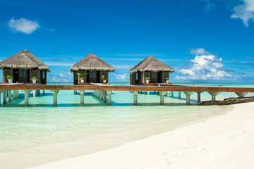 Wooden villas over water of the Indian Ocean, Maldives