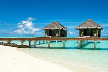 Wooden villas over water of the Indian Ocean, Maldives