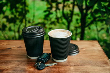 two cups of coffee on the wooden table