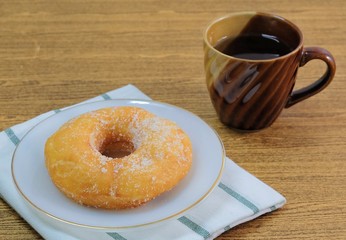 Glazed Donut with Sugar Served with Tea