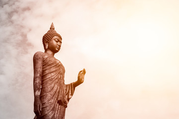 standing buddha statue