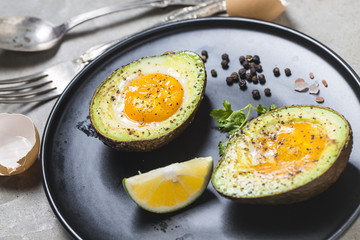 Homemade Organic Egg Baked in Avocado with Salt and Pepper