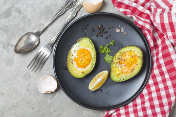 Homemade Organic Egg Baked in Avocado with Salt and Pepper