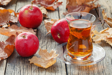 tea cup on table with fall harvest