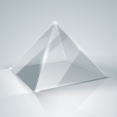 Glass pyramid. Transparent pyramid. Isolated.