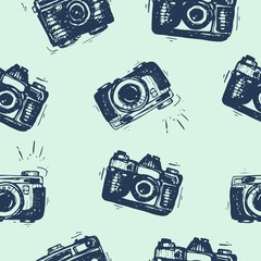 Simple pattern with cameras. Hand-drawn vintage photo camera, sketch.