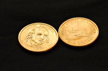 Macro photo of The United States of America one dollar coins James Madison edition