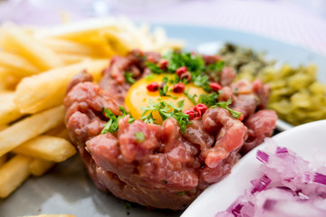 tasty Steak tartare (Raw beef) - classic steak tartare on white plate