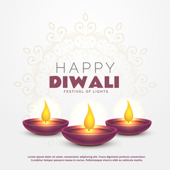 beautiful happy diwali greeting with burning diya for festival of lights