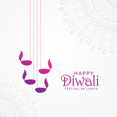 beautiful happy diwali card design with hanging diya lamps and mandala decoration