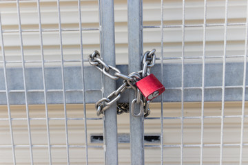 security lock and chain on fence