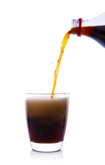 Cola in glass with ice cubes on white background