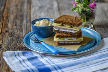 Ham Sliced Pear and Swiss Sandwich on rustic wood