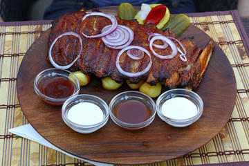 Rack of grill roasted pork spare ribs close up