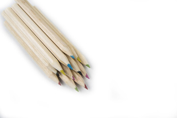 Back to school and classroom supplies with closeup on mix colored pencils on white background