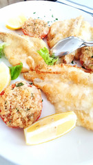 grilled fish fillets with tomatos