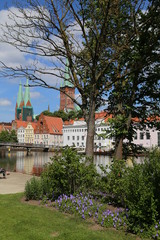 summer view of the Old Town pier architecture in Lubeck, Germany