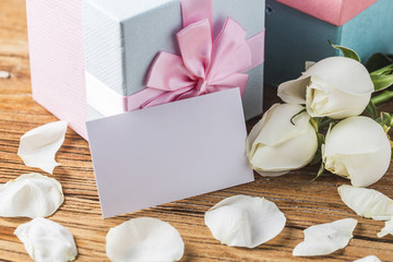 Gift roses and blank paper for valentine day holiday