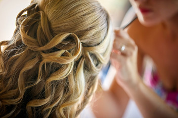 Obraz premium Makeup Artist / Hair Stylist at Work