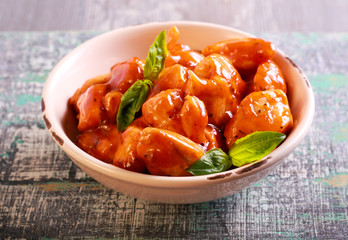 Chicken breast pieces in a tomato sauce