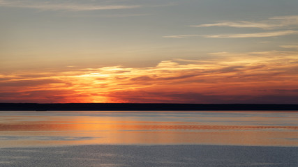 Summer sunset on the river. Backdrop or background.