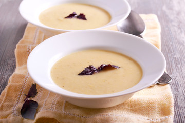 Cauliflower and courgette spicy soup in plate