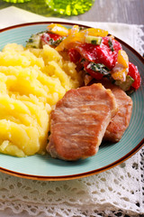 Fried pork chops, mashed potatoes and salad,