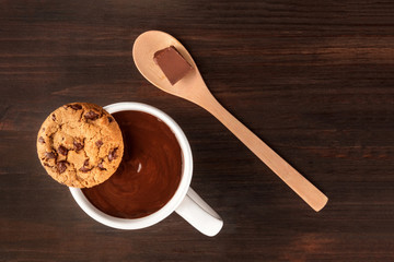 Chocolate chips cookie on dark background with copy space