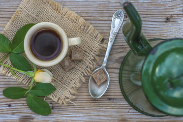 vintage coffee break/cup of espresso and vintage coffee pot on rustic background